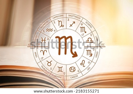 Zodiac circle against the background of an open book with scorpio sign. Astrological forecast for the signs of the zodiac. Characteristics of the sign scorpio. Astrology, esotericism, secret science