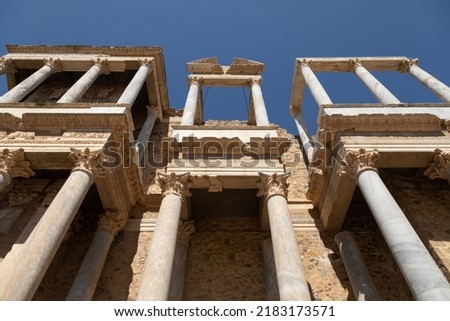Columns and architecture of the grandstand structure of the Roman Theater of Merida, declared World Heritage Site by Unesco as part of the Archaeological Ensemble of Merida Royalty-Free Stock Photo #2183173571