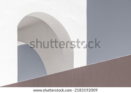 Abstract geometric architecture backgroud. Concrete volumes detail with straight lines, curves and arches in vintage tones, washed-out colors. Refined, simple, stylish, modernism, minimalism concept.  Royalty-Free Stock Photo #2183192009