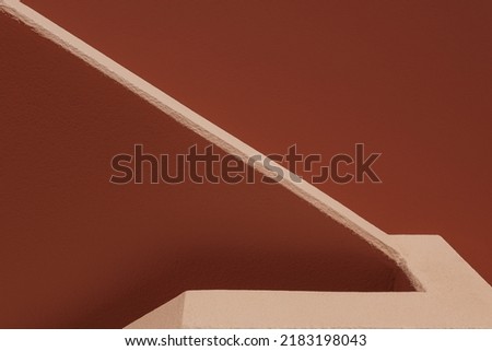 Abstract architecture background design. Angular, geometric composition with architectural details of a staircase at the sunlight. Geometry shapes up of podium in minimal style. structure lines