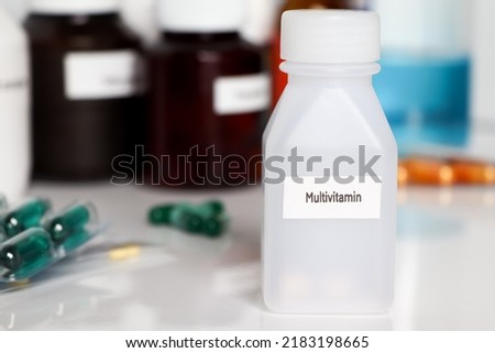 Multivitamin in bottle ,medicines are used to treat sick people.