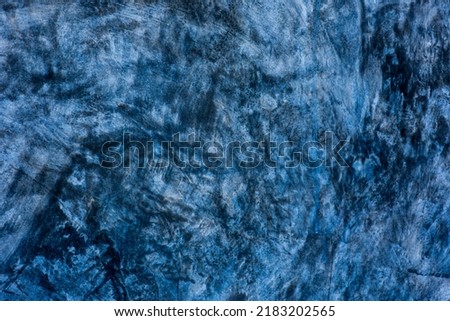 
Abstract grunge dark  blue concrete wall Background.
Old wall pattern texture mortar navy color.