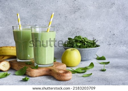 Green vegan smoothie. Smoothie with apple, banana and avocado. Detox menu Royalty-Free Stock Photo #2183203709