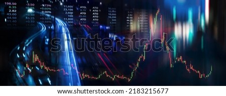 blur glowing colorful number and ticker graph of stock market business with blur motion red blue city night light banner background	