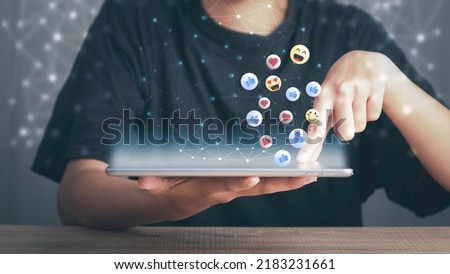 Social media communication connection online concept. Hand using smartphone and touch screen on viewing or giving likes, love, comment, friends and pages in application in digital line background.