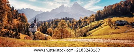 Stunning Autumn landscape. Scenic view on Maria Gern church with mountains on background. Vivid atmospheric nature scenery. Natural background. Iconic location for landscape photographers.
Formats