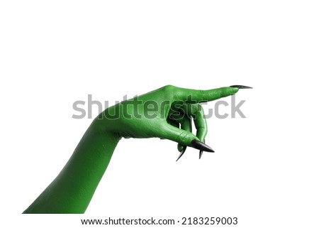 Halloween green color of witches, evil or zombie monster hand isolated on white background. Royalty-Free Stock Photo #2183259003