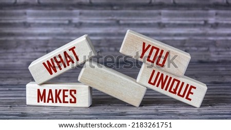 What makes you unique question on wooden blocks and wooden table