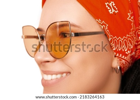 A photo of a hippie girl's face