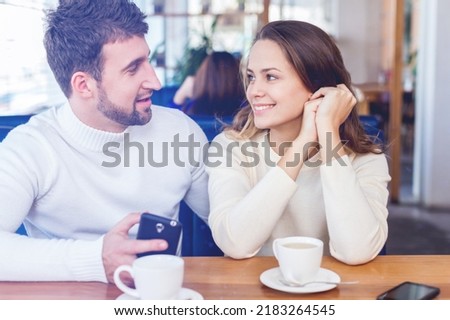 Happy couple of lover, man and woman Relationship concept with boyfriend and girlfriend at first date