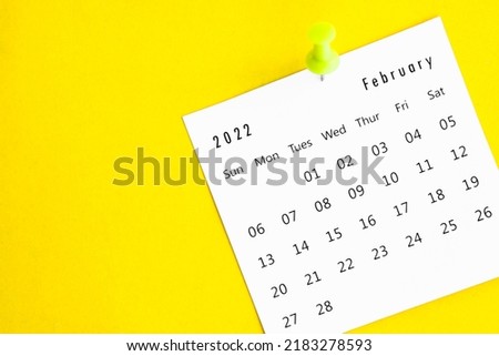 Februrary calendar 2022 on a yellow background.