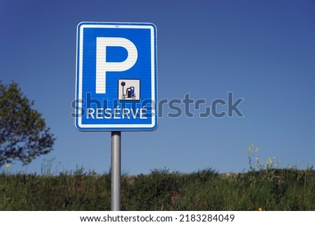 Reserve traffic sign for EV electric cars charging station, modern green energy concept reserve sign