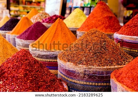 Spices Market with colourful mood. Multicolor spices sold at Egypt Bazaar (Misir Carsisi) in Istanbul, Turkey (Turkiye). Selected focus, copy space, colorful background Royalty-Free Stock Photo #2183289625
