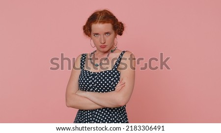 Woman feeling hopelessness and loneliness, nervous breakdown, loses becoming surprised by lottery results, bad fortune, loss, unlucky news. Ginger girl with freckles isolated on pink studio background