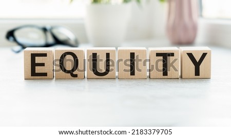 Word EQUITY made with wood building blocks. High quality photo.