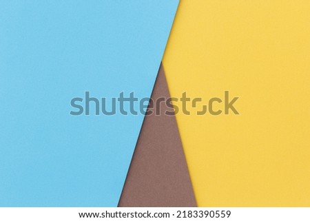 Yellow, blue and brown color paper background