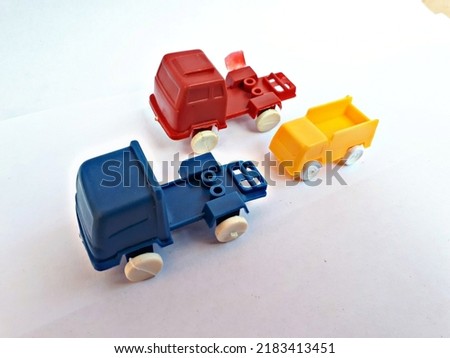 Three colorful toys car isolated on white background
