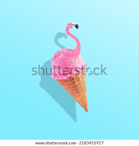 Pink flamingo in ice cream waffle cone. Minimal abstract caribbean concept of summer and vacation in the tropics by the sea, a trendy collage on a blue background.Creative art minimal aesthetic