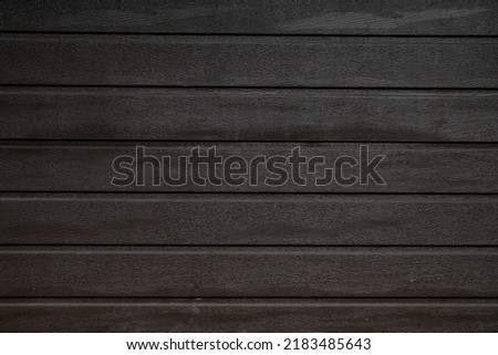 Fragment of horizontal brown painted wooden planks. Wooden background texture surface. Wood mockup wallpaper template design for decoration.