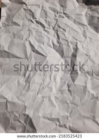 Photo with a crumpled white paper background
