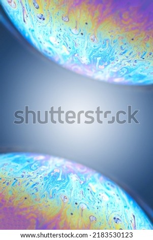 Beautiful soap bubbles animation graphics on black background. Abstract soap bubbles with colorful reflections. Soap bubbles in motion background.