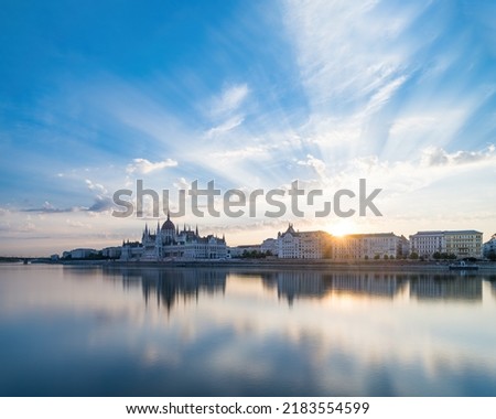 Sunrise at the Hungarian Parliament in Budapest  reflection on the Danube Royalty-Free Stock Photo #2183554599