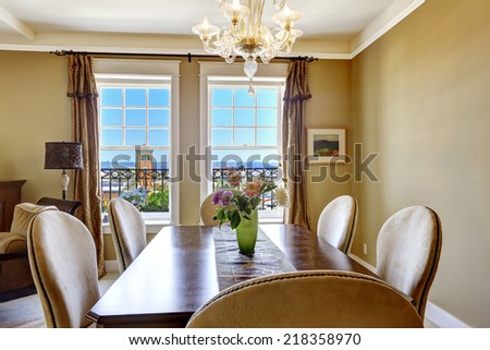 Dining table with flowers and city view through the window. Tacoma real estate, WA