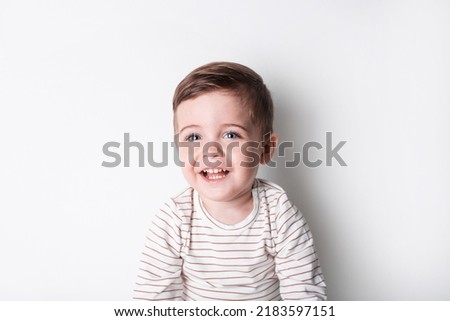 Beautiful invitation with happy toddler boy laugh. Healthy lifestyle. Kid life. Smiling happy child on white background  Royalty-Free Stock Photo #2183597151