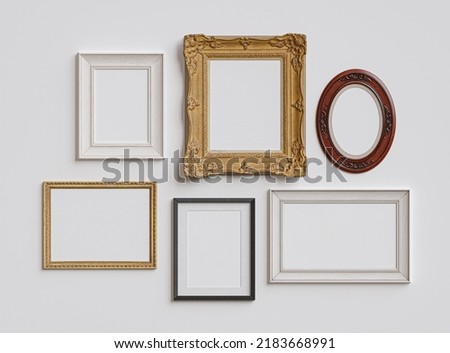Empty frame, various empty frames are hanging on the wall isolated on white, old antique frames, mocup.