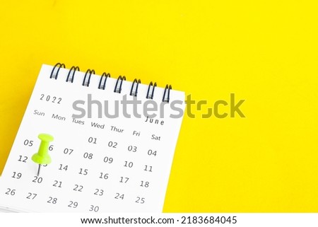Thumbtack in calendar ideas for busy reminders Appointments and meetings Planning for a business meeting or planning idea on a yellow background. Royalty-Free Stock Photo #2183684045