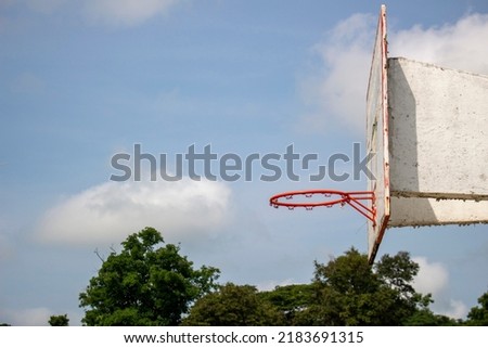 red old dirty basketball hoop