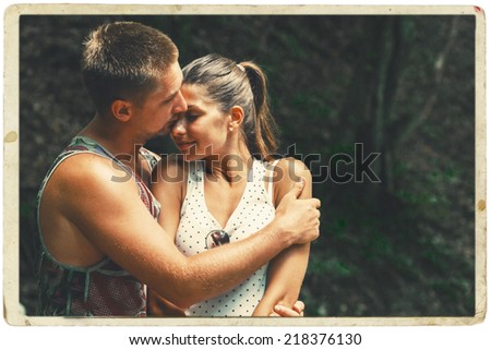 young couple in love together in summer 