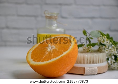 Massage brush, orange, oil, flower