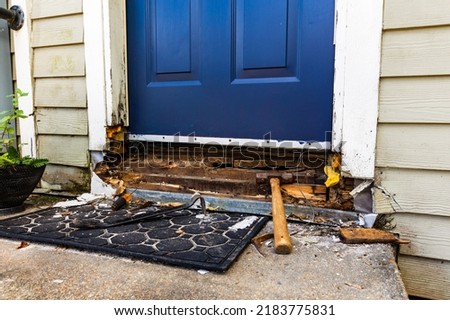 Damaged wood frame of door being repaired Royalty-Free Stock Photo #2183775831
