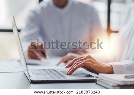 office girl's hands typing input data. Royalty-Free Stock Photo #2183873243