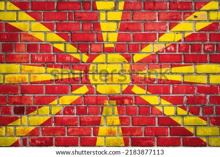 National  flag of the   Macedonia on a grunge brick background.