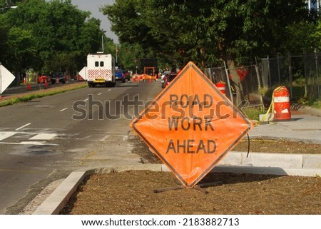 Road work sign at Washington, DC, construction site.