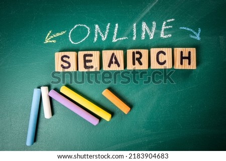 Online Search concept. Text on blackboard background.
