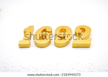  Number 1692 is made of gold painted teak, 1 cm thick, laid on a white painted aerated brick floor, visualized in 3D.                              