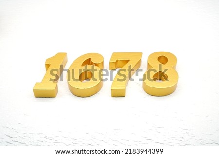 Number 1678 is made of gold painted teak, 1 cm thick, laid on a white painted aerated brick floor, visualized in 3D.                                  