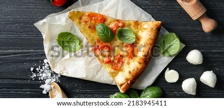 Slice of delicious pizza on table, top view