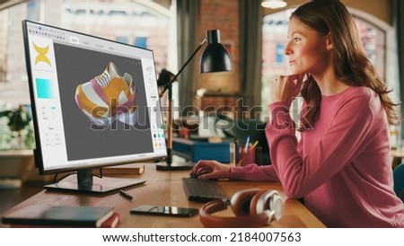 Caucasian Woman Design Video Game at Her Personal Computer in a Creative Office. Female Designing Clothing For Charachter on Her Desktop Computer. Game Graphics and Social Media Metaverse Gameplay.