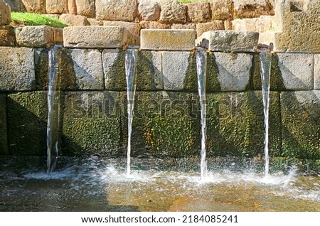 A well preserved Inca's fountain at Tipon archaeological site, the Sacred Valley of the Inca, Cuzco region, Peru Royalty-Free Stock Photo #2184085241