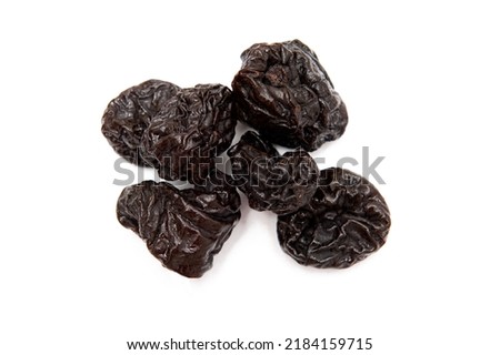 Dried plums isolated on white background
