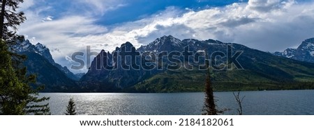 Panoramic picture of the Tetons from Jenny lake overlook. Space for words.
