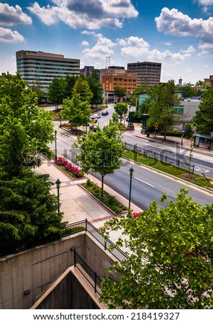 View of buildings and a divided street from the top of a parking garage in Towson, Maryland.
