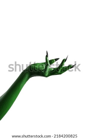 Halloween green color of witches, evil or zombie monster hand isolated on white background. Royalty-Free Stock Photo #2184200825