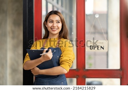 Portrait of asian woman barista cafe owner. SME entrepreneur seller business concept.