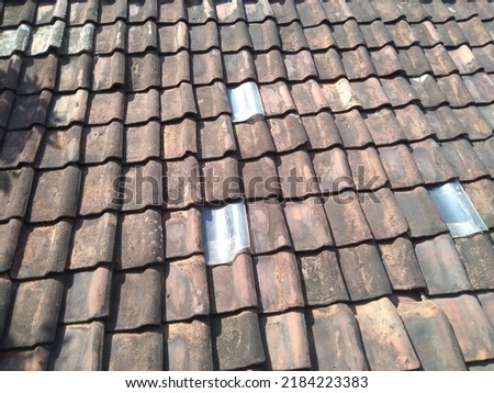 photo of an old model of clay tile roof, made of clay that was burned in the production process
