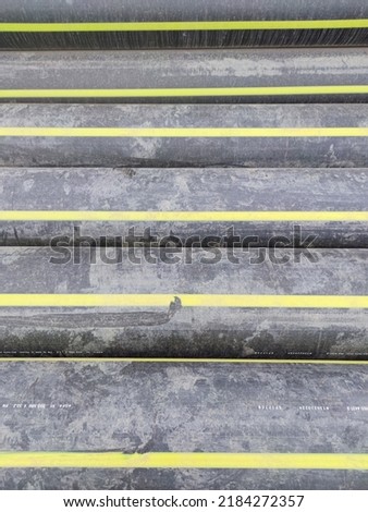 hdpe pipes on warehouse. Wide shot industrial background